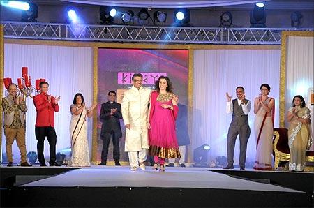 B S Nagesh, founder, TRRAIN and Ameesha Prabhu, CEO, TRRAIN walk the ramp.