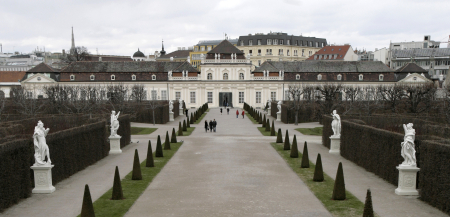 Visitors walk through the park of the Belvedere Museum in Vienna.