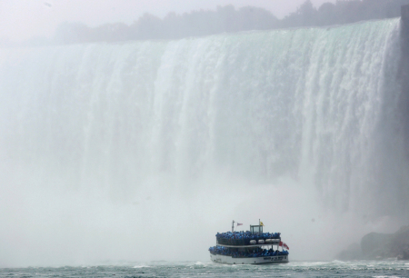 The 'Maid of the Mist' ventures at the bottom of the Horseshoe Falls at Niagara Falls, Ontario.