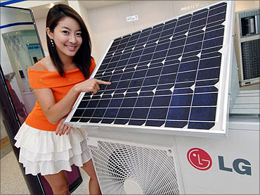 Hybrid air conditioner equipped with a solar cell module.