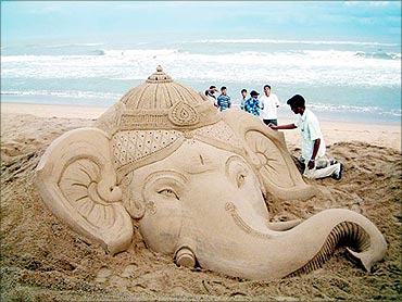 A sand sculpture of Lord Ganesha at Puri beach, Orissa.