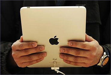 A customer hold the new iPad tablet.