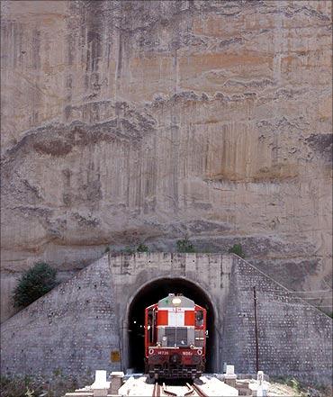 A train passes through a tunnel on Jammu-Udhampur rail line.