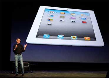 Steve Jobs introduces the iPad 2 during an Apple event in San Francisco, California on March 2, 2011.