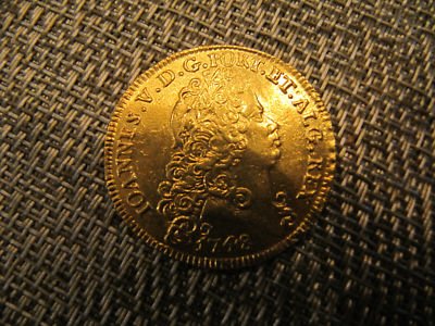 A Portugese gold coin.