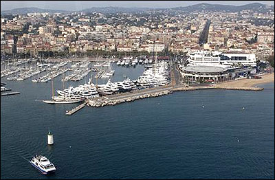 A general view shows the harbor and the Festival Palace (R), the venue of the G20 summit in Cannes.
