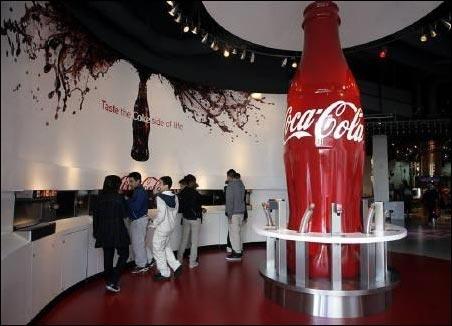 Patrons taste coca cola.