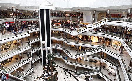 People stroll at a shopping mall in Istanbul.