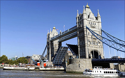 PS Waverley, the last seagoing passenger carrying paddle steamer in the world makes it's way under Tower Bridge, London.