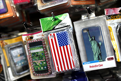 Cell phone covers are seen on display in a shop in New York City.