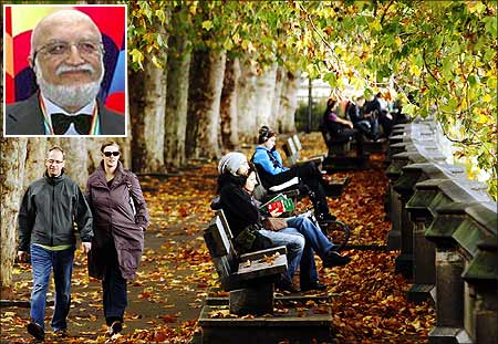 People enjoy Autumn sunshine in Victoria Tower Gardens in London. Vijaypat Singhania (inset).