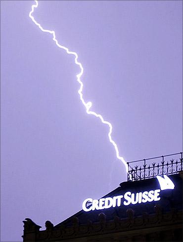 Lightning strikes over the headquarters of Swiss bank Credit Suisse d in Zurich.