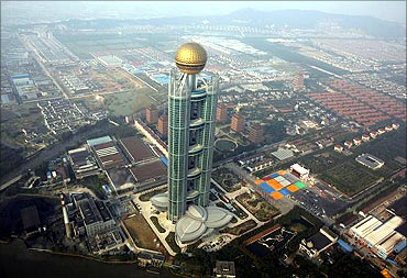 The newly inaugurated skyscraper tower of Huaxi village is seen in Huaxi village.