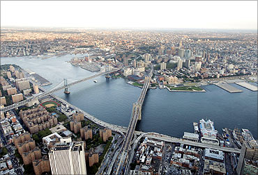Brooklyn Bridge, right, and Manhattan Bridge, left, span the East River in Manhattan.