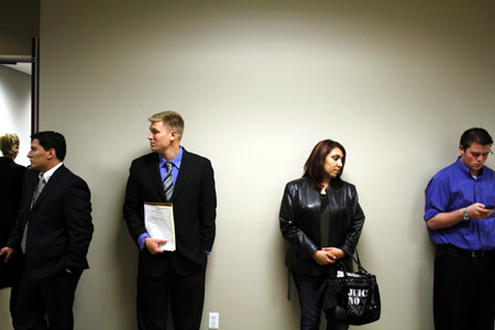 People wait to be interviewed during the Chase Bank Veterans Day job fair in Phoenix, Arizona.