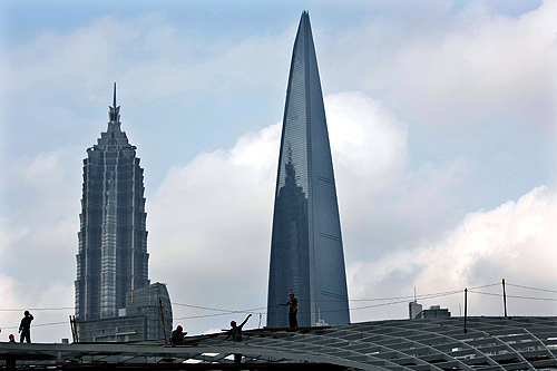 The Jin Mao Tower (L) and the Shanghai Financial Centre (R).