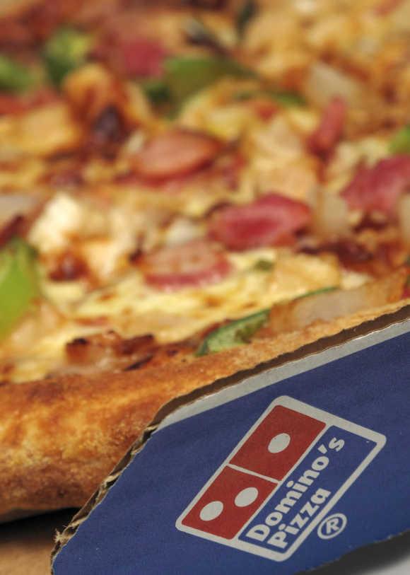 Domino's has 439 stores across 100 cities.