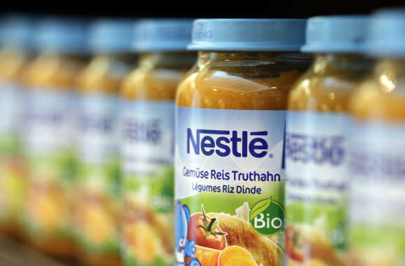 Bottles of baby food are seen in the company supermarket at the Nestle headquarters in Vevey, Switzerland.