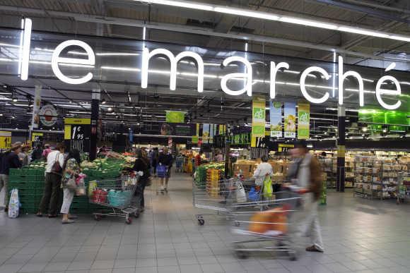 Shoppers inside the Carrefour Planet in Lyon, France.