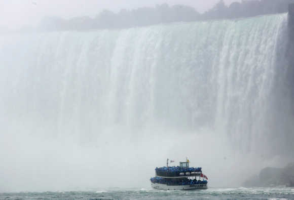 The 'Maid of the Mist' ventures at the bottom of the Horseshoe Falls, Canadian side, at Niagara Falls, Ontario.