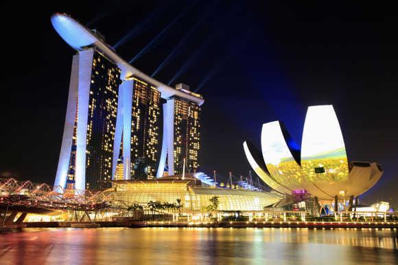 The Marina Bay Sands Hotel and ArtScience Museum is seen before Earth Hour in Singapore.