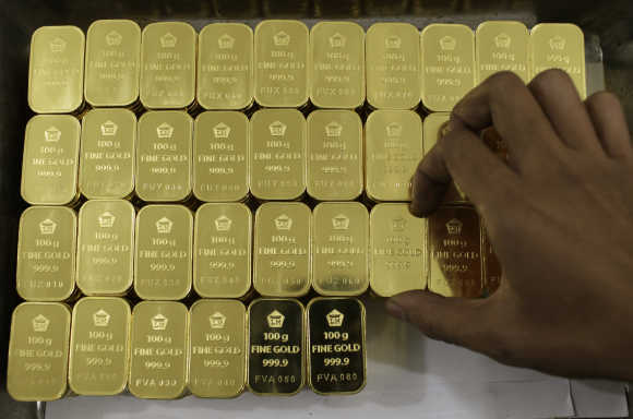 Gold piece, each weighing 100 grams, are seen at a mining company in Jakarta, Indonesia.