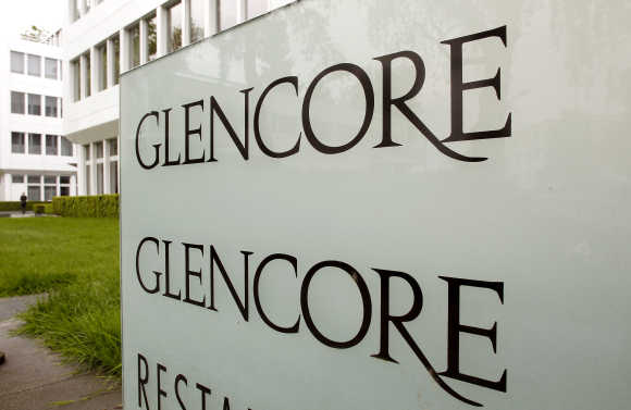 Logo of Glencore is seen in front of the company's headquarters in the Swiss town of Zug.