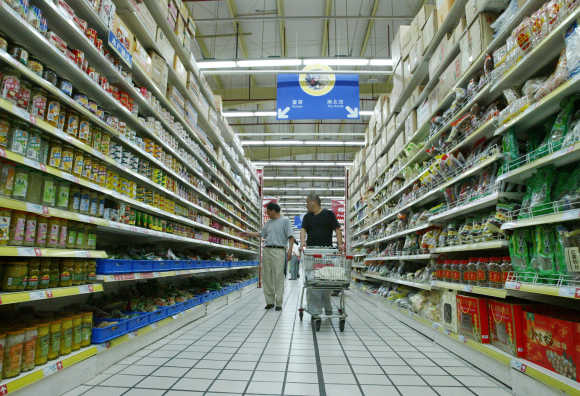Shoppers at a supermarket in Shanghai.