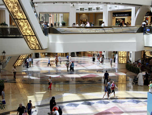 People shop at the Mall of the Emirates in Dubai.