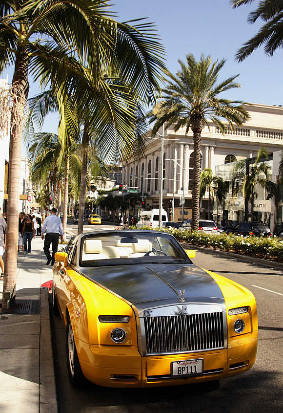 Rolls-Royce convertible is seen parked on Rodeo Drive in Beverly Hills.