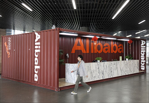 An employee walks inside the headquarters office of Alibaba (China) Technology Co. Ltd on the outskirts of Hangzhou.