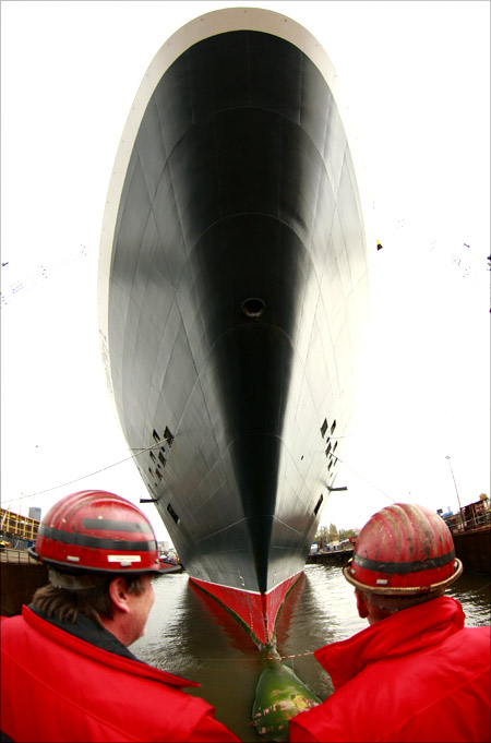 Cruise ship Queen Mary 2 docks in at Blohm + Voss shipyard in Hamburg.