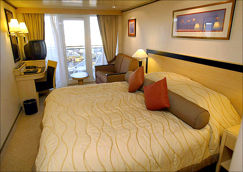 View in one of the middle class bedrooms, on board the Queen Mary 2.