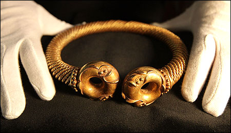 An Iron Age Torc, estimated to be as old as 50BC, made from gold and silver and valued at GBP 350,000 is on display.