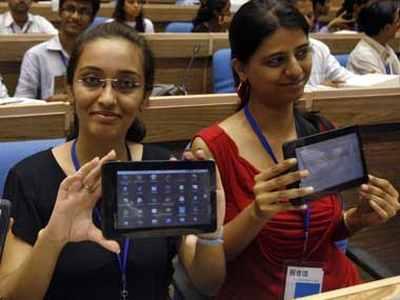 Students with Aakash tablets.