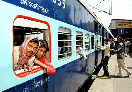 A passenger train that was hijacked arrives at the Daltangunj railway station.