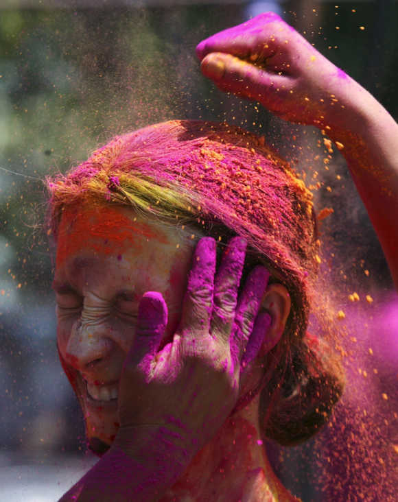 A woman celebrates Holi in Hyderabad.
