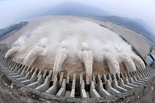 The Three Gorges Dam Project discharges flood water to lower the water level in the reservoir in Yichang, Hubei province.