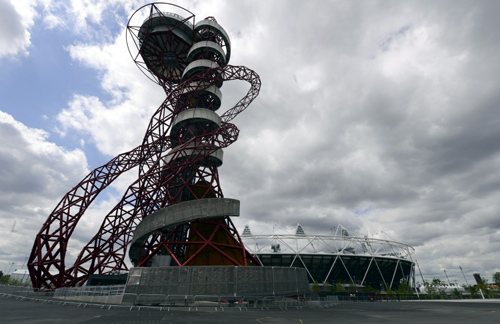 The ArcelorMittal Orbit stands next to the Olympic Stadium in the London 2012 Olympic Park in east London.
