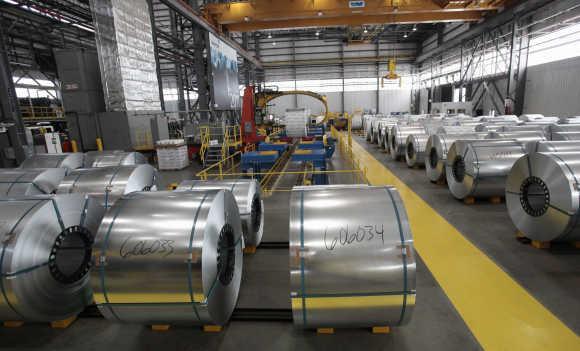 Steel coils wait to be shrink wrapped and shipped to customers at the Severstal steel mill in Dearborn, Michigan.