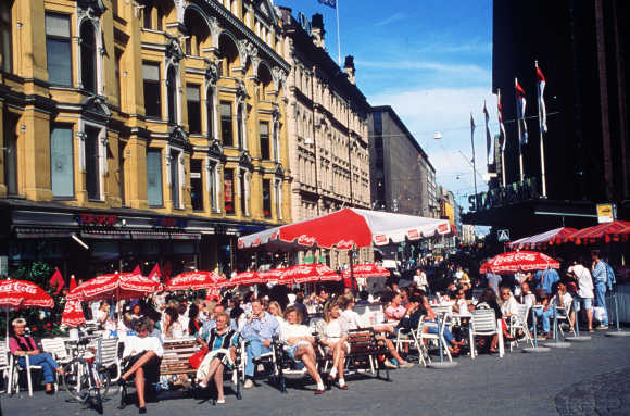 A view of a cafe in the square of the Three Blacksmiths, Helsinki.