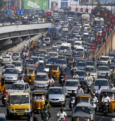Vehicles move slowly during morning rush hour in the southern Indian city of Hyderabad.