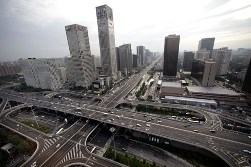 A general view of the office buildings and Guomao Bridge (bottom) in Beijing's Central Business District