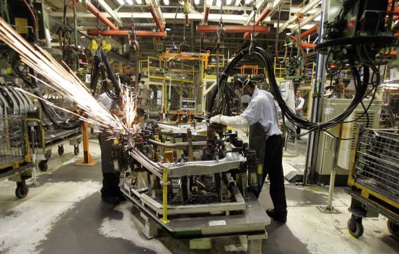 Workers at a plant in Camacari in Brazilian state of Bahia.