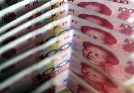 One-hundred Yuan notes are seen in this picture illustration