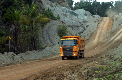 A truck takes earth containing nickel ore from a mine to a port on Halmahera island in eastern Indonesia.