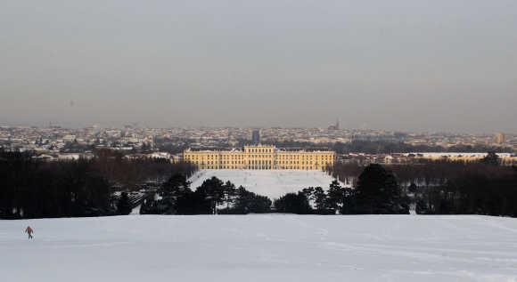 The evening sun illuminates Schoenbrunn palace in Vienna.