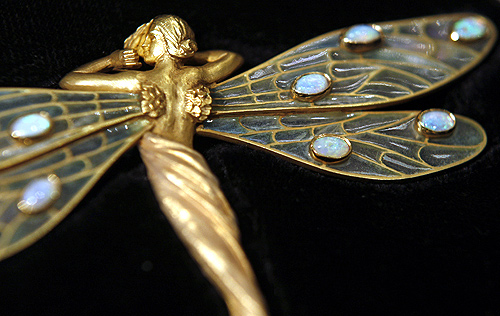 An art nouveau Spanish brooch from the 1910's, made from 18-carat gold and set with opals and worth  36,000, is displayed at Bentley and Skinner jewellers in London.