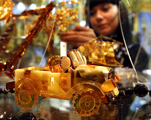 UAZ automobile exhibit, made amber and which costs about $650,000, is displayed during the Junwex Petersburg jewelry exhibition in St. Petersburg.