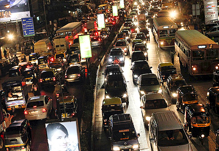 Vehicles are seen in a traffic jam during rush hour in Mumbai.